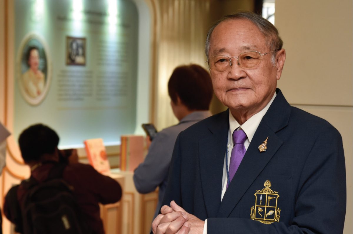an asian old man in a formal suit 